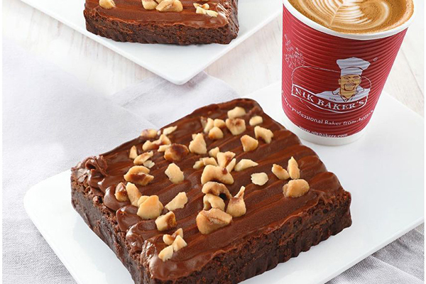 Brownie and Coffee cup on Table at Nik Baker’s