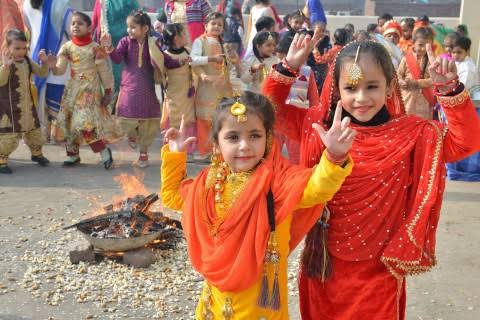 Girls dancing in Lohri Celebration