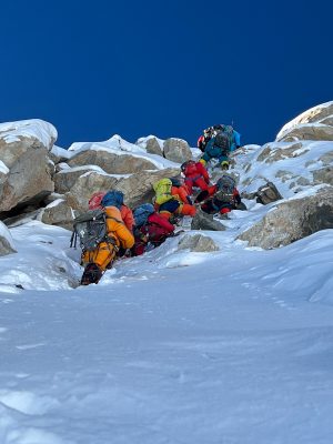 Mountaineer climbing the mountain