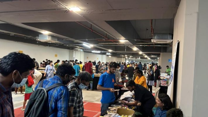 People Purchasing books in book Fair