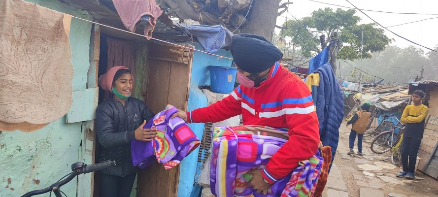 Sukhman Singh donating Goods